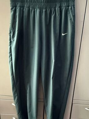 Nike Deep Teal Track Pants with White Swoosh